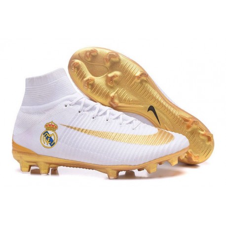 white and gold soccer cleats