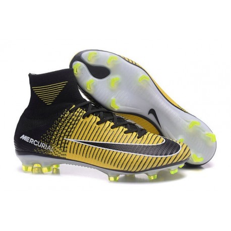 black and yellow nike cleats