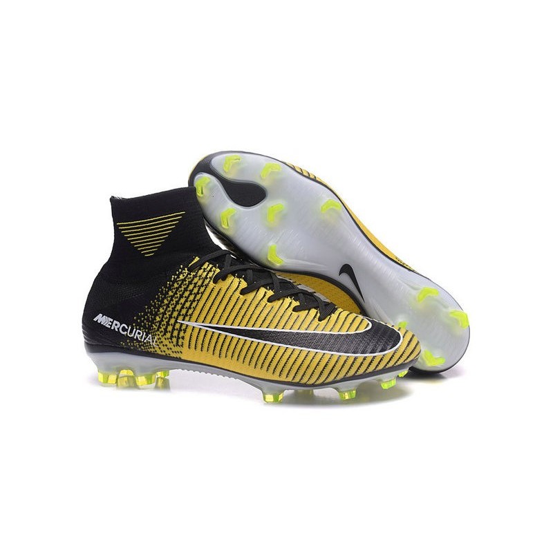 yellow and white football cleats