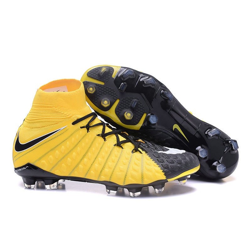 black and yellow nike soccer cleats