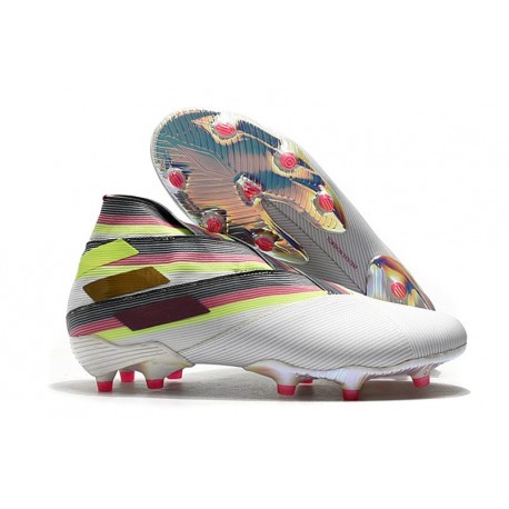 pink and white soccer cleats