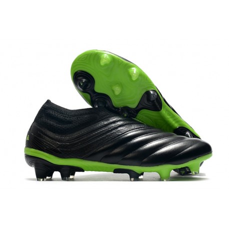 green and black adidas soccer cleats